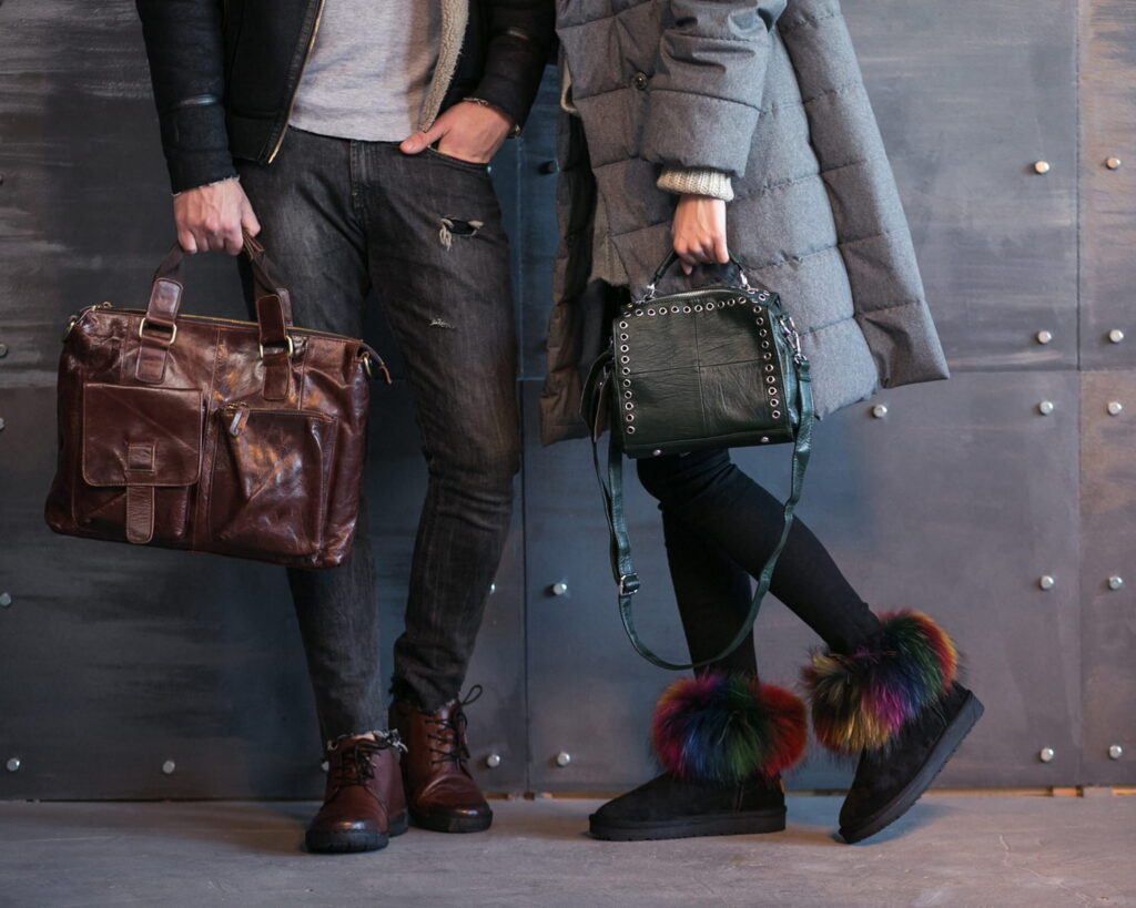 a couple holding hand carry bags