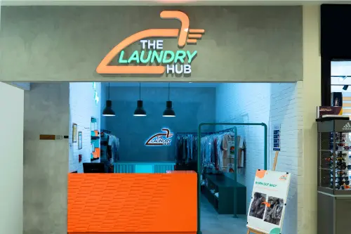 The Laundry Hub storefront with branded reception area