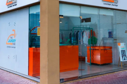 The Laundry Hub glass storefront with visible interior