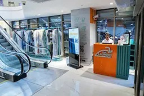 The Laundry Hub storefront with service counter and racks
